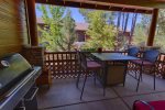 Great back patio with grill and seating